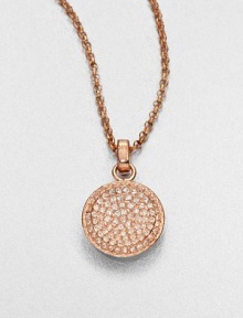 From the Brilliance Collection. A pretty pavé pendant has a slight concave shape that enhances the sparkle of its light-catching glass stones as it hangs from a graceful rose-finished chain.GlassRose goldtoneChain length, about 16Pendant diameter, about .5Clasp closeImported