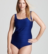 Elevate your poolside portfolio with Gottex's solid square-neck tankini. With a classic look and flattering cut, this top exudes aquatic allure.