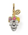 Here's a heads up: This Juicy Couture skull charm adds a dash of oh so spooky style, cast in brass with crystal accents.