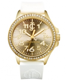 A sparkling ring of accents surrounds a golden case on this Jetsetter watch from Juicy Couture.