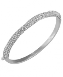 The perfect gift for your bridesmaids, Carolee's elegant style is perfect for walking down the aisle. Crafted from silver tone mixed metal, this hinged bangle features pave-set glass accents. Approximate diameter: 2-1/8 inches x 2-1/2 inches.