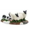 A trusty Border Collie rounds up the sheep; a perfect figurine to coordinate with any country building from the Dickens' Village from Department 56. Crafted of hand-painted porcelain.