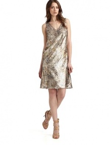 THE LOOKAll-over rectangular sequinsDouble v-neckSleevelessBust dartsBack zip closureTHE FITAbout 39 from shoulder to hemTHE MATERIALPolyesterFully linedCARE & ORIGINDry cleanImportedModel shown is 5'9½ (176cm) wearing US size 4. 