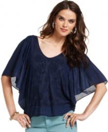 Beat the heat in this vintage-inspired cotton top from DKNY Jeans. The flutter sleeves and embroidery at the chest are bohemian-chic touches that add instant coolness to to you wardrobe.