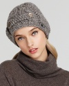 This soft, hand-knit toque from Nobis sports vintage-inspired button details.