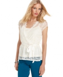 Pretty lace and a wrap silhouette make up this charming petite top from NY Collection. (Clearance)