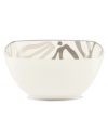 Abstract markings in soft shades of khaki fill in this glazed white bowl for unconventional elegance. From Noritake dinnerware, these dishes are trimmed with matte platinum. Its sleek, modern shape looks sharp on casual and formal tables alike.