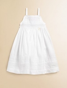 This angelic A-line silhouette is topped with pintucked and embroidered details.SquareneckSpaghetti strapsBack buttonsFull skirtCottonMachine washImported Please note: Number of buttons may vary depending on size ordered. 