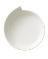 Explore new shapes for your table with the innovative New Wave pizza plate, featuring a unique, fluid silhouette crafted of premium Villeroy & Boch porcelain.