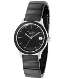 Gunmetal tones add edge to this classic steel watch from Kenneth Cole New York.