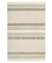 Linear designs are accented with exotic faux silk to create a timeless palette in the Sahara area rug from Calvin Klein. Crafted by skilled artisans in India, it features generously thick wool and viscose fibers woven to create remarkable strength and impeccable elegance.