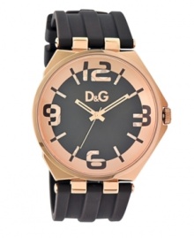 Show them what you're made of. Revealing cutaways mark this unique watch by D&G. Brown rubber strap and round rose-gold ion-plated stainless steel case. Black dial with rose-gold tone outer ring features partially transparent numerals and stick indices revealing watch's gears, three hands and logo. Quartz movement. Water resistant to 30 meters. Two-year limited warranty.