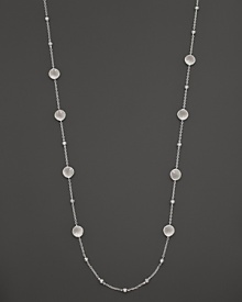 Faceted doublets of clear quartz and mother-of-pearl in sterling silver. By Ippolita.