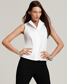 An elevated take on the classic white shirt, the perennial favorite gets a streamlined update with this Jones New York Collection blouse featuring a winged collar and sleek, tailored fit.