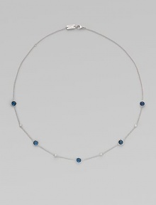 From the Silver Rain Collection. A simply chic style with rich London blue topaz and dazzling diamonds on a delicate sterling silver link chain. London blue topazDiamonds, .2 tcwSterling silverLength, about 18Lobster clasp closureImported 