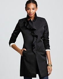 A well-placed ruffle lends feminine flair to this all-essential lightweight coat from DKNY.