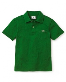 A Bloomingdales.com exclusive! The iconic classic: Lacoste's polo shirt with a spread collar and the signature alligator embroidery over a handy chest pocket.