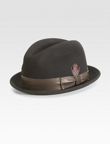 A dapper wool and leather hat accented with a feather. WoolLeather accentBrim, about 1½Spot cleanImported