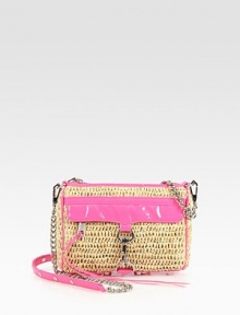 Textured raffia is paired with lustrous and vibrant patent leather in this versatile, compact design. Removable chain and patent leather shoulder strap, 23 dropTop zip closureOne outside zip-flap pocket and lock closureProtective metal feetCotton lining8¾W X 6¼H X 1½DImported