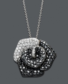 Channel glamorous 1950s style with this vintage-inspired pendant by Effy Collection. Delicate flower petals feature round-cut black diamonds (1-3/8 ct. t.w.) and round-cut white diamonds (5/8 ct. t.w.) set in 14k white gold. Approximate length: 18 inches. Approximate drop: 3/4 inch.