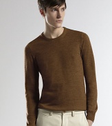 A smooth, streamlined pullover sweater knitted in a rich Italian wool.CrewneckRibbed knit collar, cuffs and hemWoolDry cleanMade in Italy