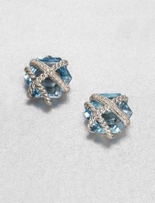 From the Cable Wrap Collection. An pretty, hexagon-shaped blue topaz stone wrapped in sterling silver cables and dazzling diamonds. Blue topazDiamonds, .07 tcwSterling silverSize, about .39Post backImported 