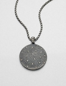 From the Cable Coil Collection. Brilliant diamonds sprinkled over a coiled cable design. Sterling silverDiamonds, .37 tcwPendant size, about 1.33Fixed baleImported Please note: Chain sold separately. 