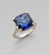 Cushion-cut blue corundum sparkles in a delicate sterling silver setting.Blue corundumSterling silverWidth, about ½Imported