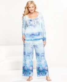 Embrace the lovely decorations of winter while staying warm and cozy in One World's Frozen Snowfall plus size pajamas.