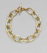 From the Glamazon Collection. Bold, freeform ovals of 18k gold, linked together and clasped with a signature toggle. 18k yellow gold Length, about 8½ Toggle closure Made in Italy