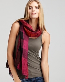 In rich autumn hues, this Burberry scarf looks fresh in a mulberry silk and linen fabrication.