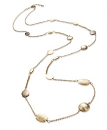 Layer on some lovely length with this golden necklace from Alfani. Displays hematite and gold tone beads for a shaky feel. Crafted in gold tone mixed metal. Approximate length: 51 inches.