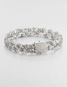 An intricately braided, sterling silver design accented with a dazzling diamond encrusted closure. Sterling silverDiamonds, .42 tcwLength, about 7.25Push clasp closureImported 