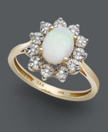 Create a magical look with  sparkling gemstones and royalty-inspired design. Ring features oval-cut opal (5/8 ct. t.w.) encircled by diamond accents. Crafted in 14k gold.