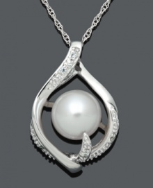 An elegant accent piece. This timeless style highlights a pretty, diamond-accented teardrop cradling a cultured freshwater pearl (8-9 mm). Setting and chain crafted in sterling silver. Approximate length: 18 inches. Approximate drop: 1 inch.