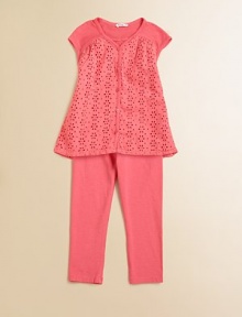 Sweet eyelets adorn a plush cotton tunic with matching leggings for a vibrant, classic ensemble.V-neckShort cap sleevesButton frontFront yokeFlared shapeElastic waistbandCottonMachine washImported