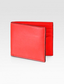 A familiar design crafted in slim-lined, smooth leather featuring two pocket sleeves and a herringbone lining for a cool contrast.One billfold compartmentSix card slotsLeather4 x 4Imported