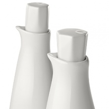 Borrowing from nature, this oil & vinegar cruet set has a highly glossed surface and unusual contours, creating an interesting silhouette - a DVF signature - on the table.