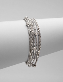 From the Petite Pavé Bead Collection. Eight box-link strands of shining sterling silver, dotted with shimmering pavé diamond beads. Diamonds, 0.49 tcw Sterling silver Length, about 7½ Lobster clasp Imported