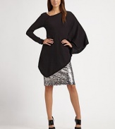 A new angle on a luxurious top, knit of silk and cotton with two different sleeves and a dramatic diagonal hem.Off-center V neckline with exposed seamOne long slim sleeve, one long draped batwing sleeveAngular hemAbout 24¾ from shoulder to hem55% silk/45% cottonDry cleanImported Model shown is 5'9½ (176cm) wearing US size 4. 