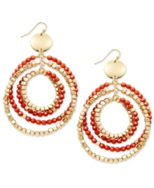 A colorful take on the traditional hoop earring. INC International Concepts incorporates vivid plastic beads in coral hues. Set in gold-plated mixed metal. Approximate drop: 3-1/2 inches.