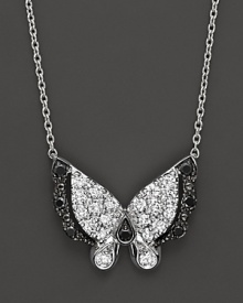 Black and white diamonds set in a 14K. white gold butterfly pendant.