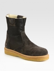 Elegant suede design, with contrasting rubber sole and cozy shearling lining.Leather upperRubber soleMade in Italy