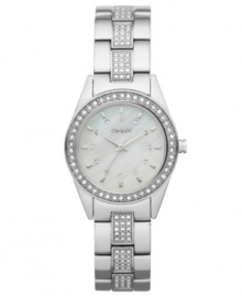 The classic styling of this DKNY timepiece has been given an upgrade of crystal shimmer. Crafted of stainless steel bracelet embellished with 90 crystal accents and round stainless steel case. Bezel embellished with 46 crystal accents. White dial features 12 crystal dot markers, silver tone three hands and logo at twelve o'clock. Quartz movement. Water resistant to 50 meters. Two-year limited warranty.