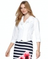 Feminine ruffles are balanced by the crisp double-pointed hemline on Jones New York Signature's petite shirt.