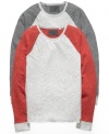 Step up to the style plate. This raglan t-shirt from Guess has inimitable cool for your casual look.