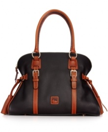 Ultra-feminine and undecidedly chic, this luxurious leather satchel from Dooney & Bourke will add a touch of elegance to any ensemble. Exquisite detail stitching and flirtatious tassel accents adorn the exterior, while several pockets and compartments provide exceptional organization within.