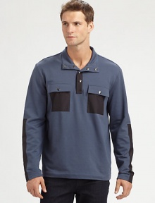 Fleece pullover with modern inspirations, accented with nylon contrasting trim and double-chest pockets for a handsome finish.Button-front95% cotton/5% lycraMachine washImported