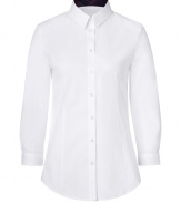 Turn up your cuffs and showcase Burberrys iconic check in this crisp white button-down from Burberry London - Classic collar with checked lining, 3/4 sleeves, buttoned turn-up checked cuffs, button-down front, shirttail hemline - Form-fitting - Wear with everything from jeans and flats to pencil skirts and heels