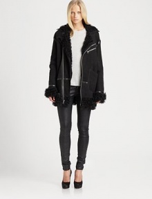 Soft, aviator-inspired leather jacket, defined by plush shearling, contrast trim and a length that hits below the hips.